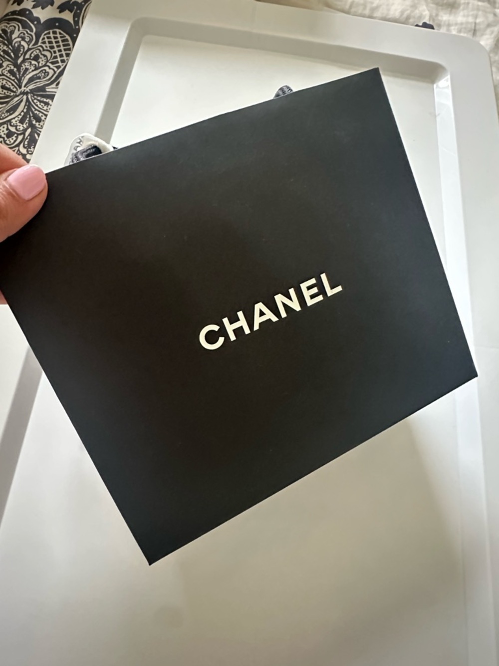 CHANEL Black Paper Bag with White Logo